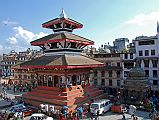 Kathmandu Durbar Square 03 05 Kumari Bahal, Trailokya Mohan Narayan Temple, Garuda Statue, Bimaleshwor Temple The edge of Basantapur Square, Kumari Bahal, Trailokya Mohan Narayan Temple, the Garuda Statue, and Bimaleshwor Temple are visible from the steps of Maju Deval Temple in Kathmandu Durbar Square.